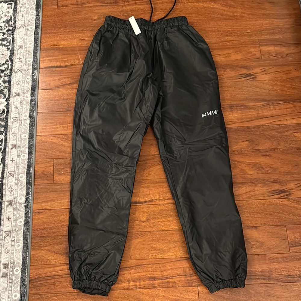Black Pants & Jumpsuits with Sleek Design